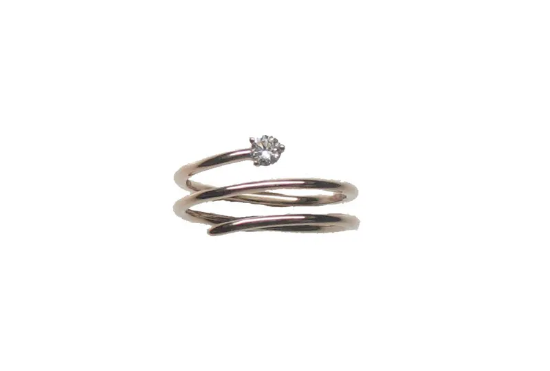 Anillo abierto de oro rosa de 18K con diamante en talla brillante