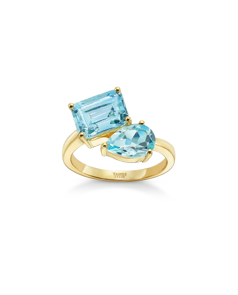 Anillo Bow topacio azul, plata dorada