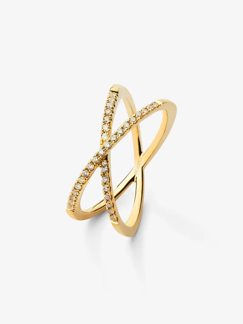 Anillo cruzado de oro amarillo de 18K con 33 diamantes en talla brillante con un total de 0,2 cts