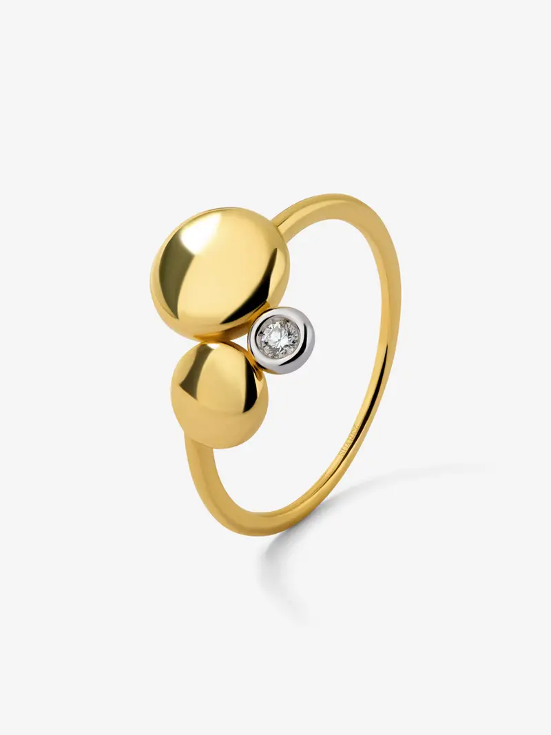 Anillo de oro amarillo de 18K con diamante en talla brillante de 0,03 cts y motivos de esferas