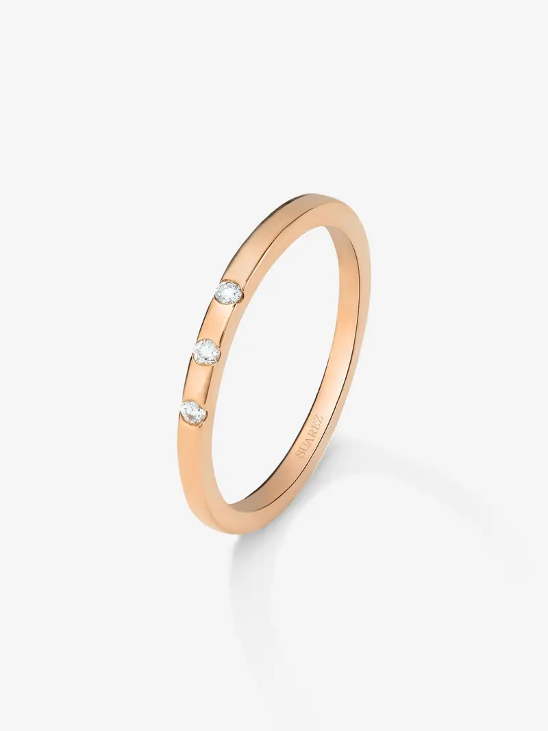 Anillo de oro rosa de 18K con 3 diamantes en talla brillante con un total de 1,4 cts
