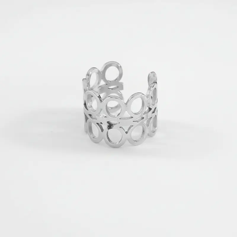 Anillo grande de acero con dos filas de circunferencias acabado brillante