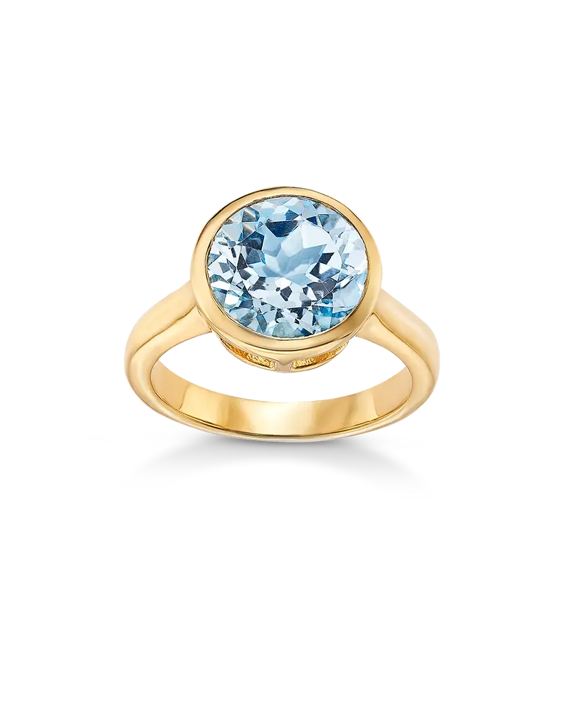 Anillo Sara topacio azul, plata dorada