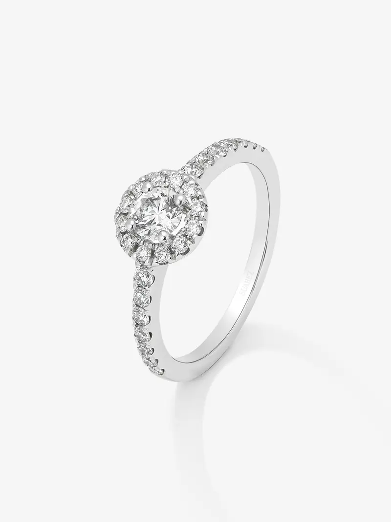 Anillo solitario de compromiso de oro blanco de 18K con diamantes