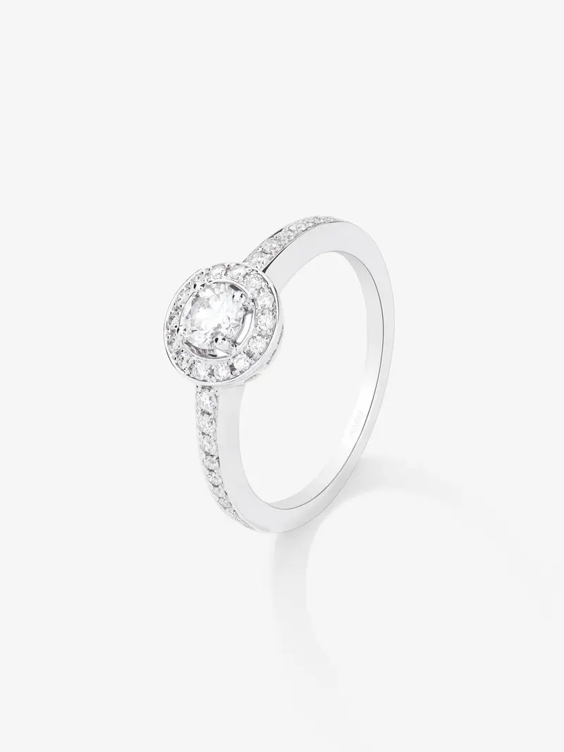 Anillo solitario de compromiso de oro blanco de 18kt con diamante central de 0,40cts