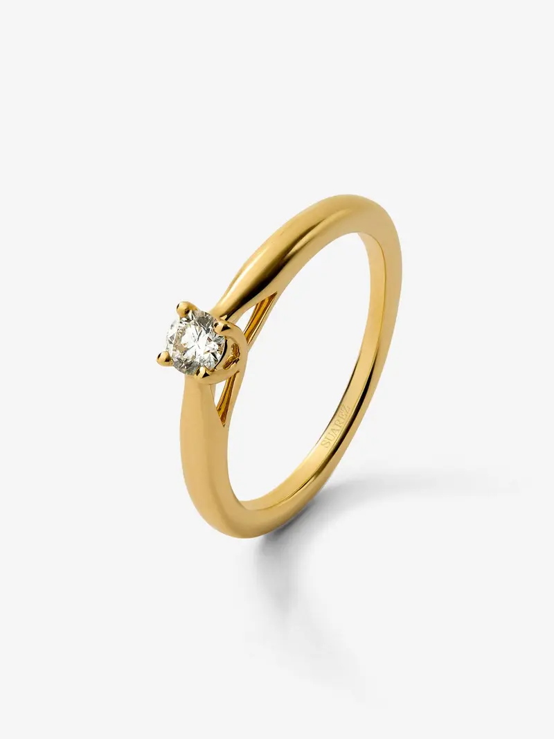 Anillo solitario de oro amarillo de 18K con diamate en talla brillante de 0,08 cts