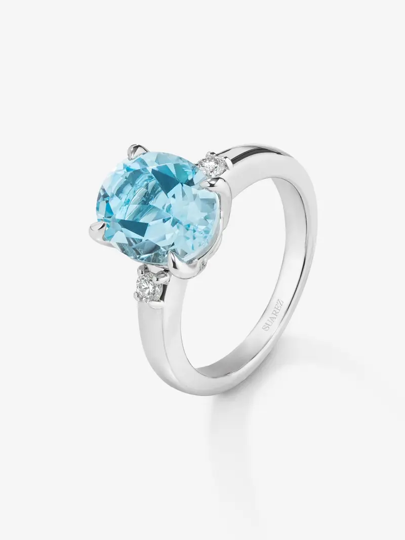 Anillo tresillo de plata 925 con topacio azul Sky y diamantes