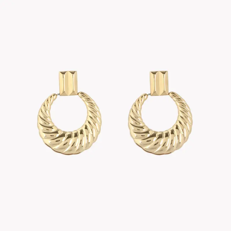 Aros de acero con textura acabado oro