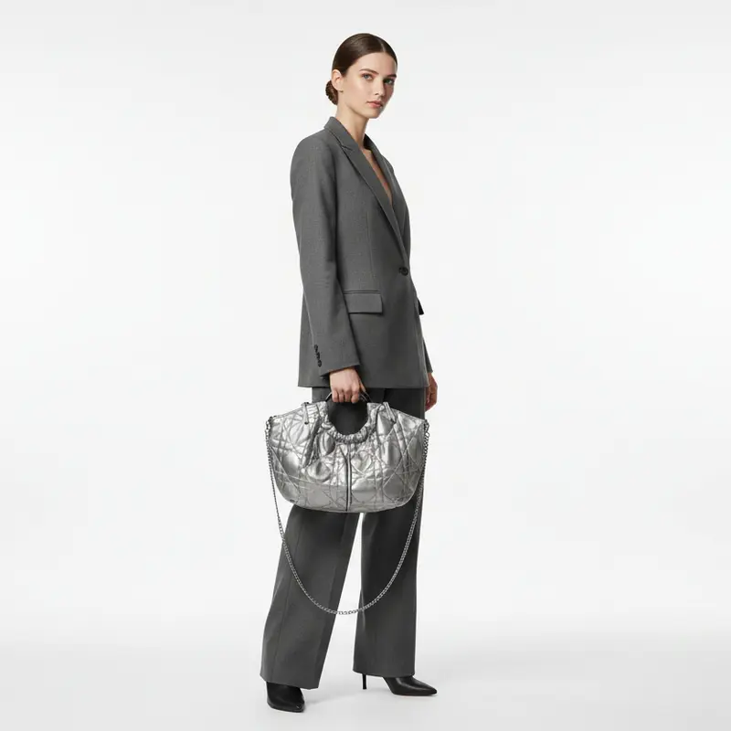 Bolso circular de asa metálica guateado acabado plata
