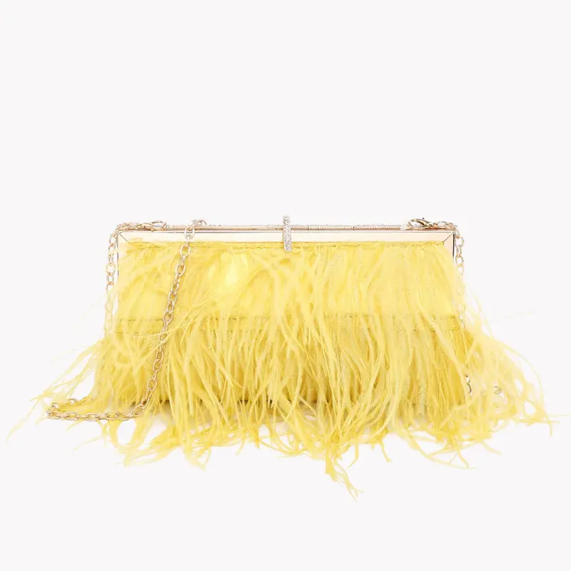 Bolso de fiesta tipo clutch con plumas amarillo
