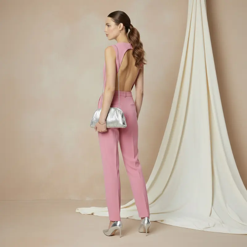 Bolso de fiesta tipo clutch de mano plisado color plateado