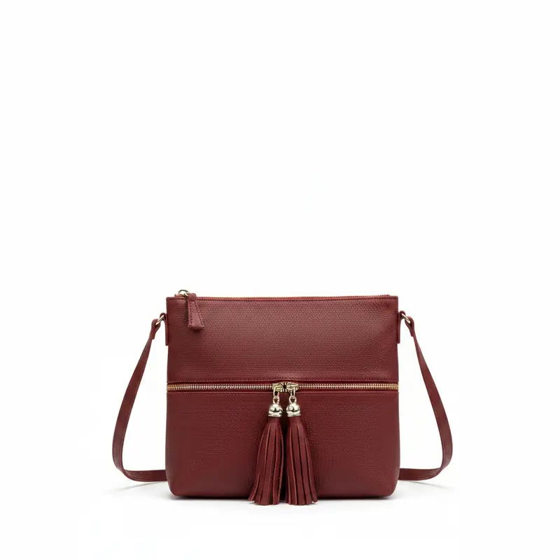 Bolso de piel 100% auténtica bandolera con detalle de cremalleras delanteras en plata color burdeos