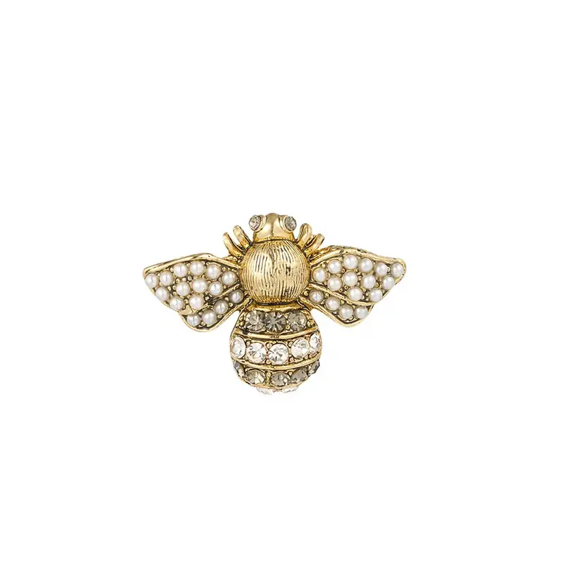 Broche en forma de abeja con circonitas y perlas acabado oro