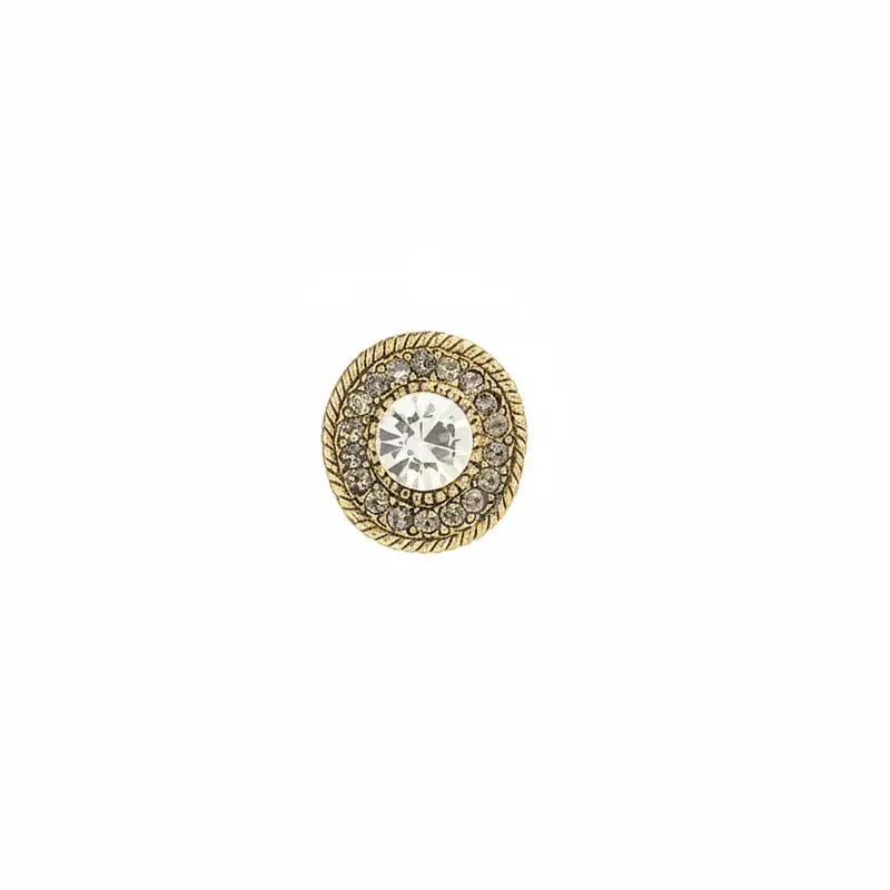 Broche pequeño y redondo con circonitas en diferentes colores y un acabado oro
