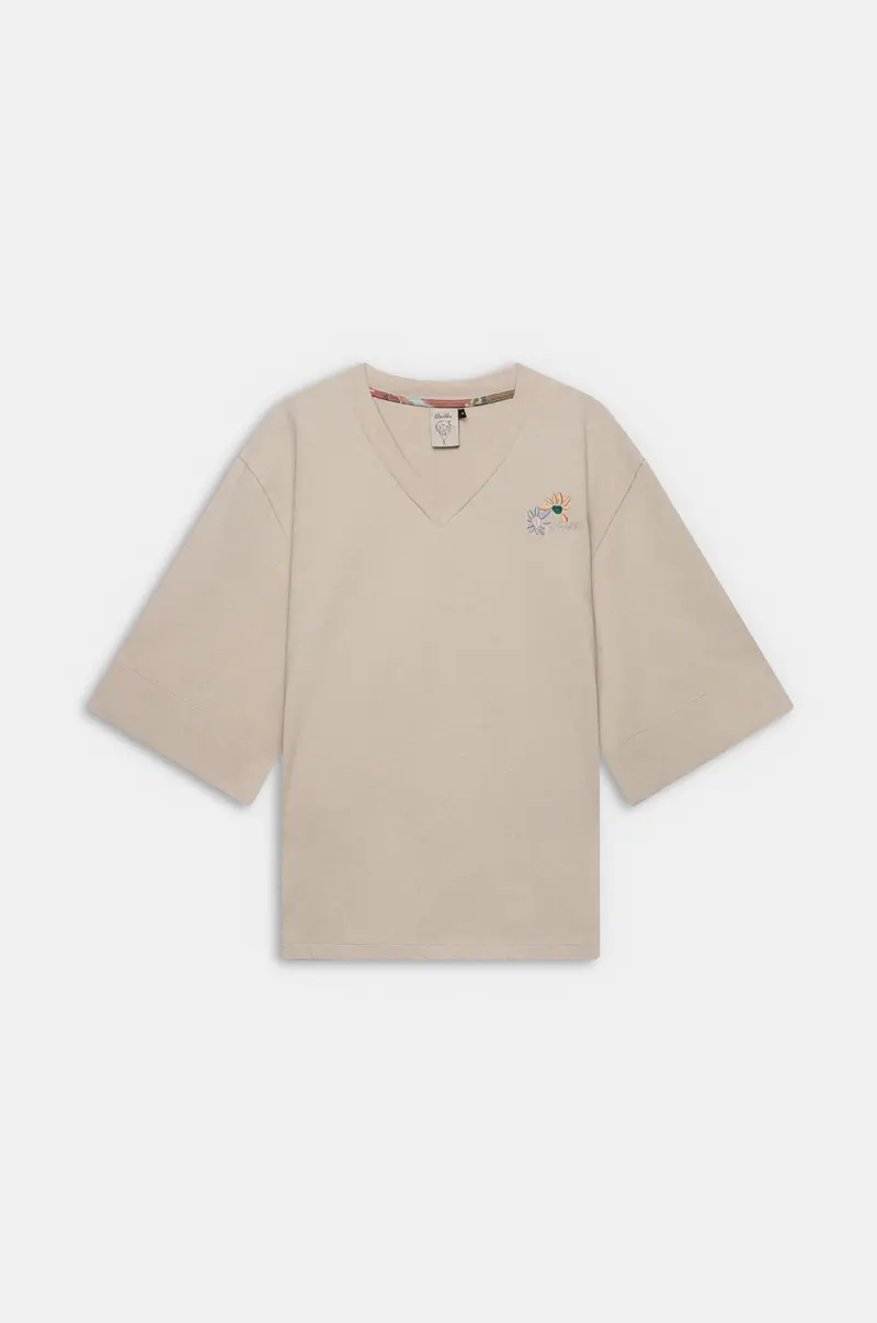 Camiseta oversize beige con cuello de pico