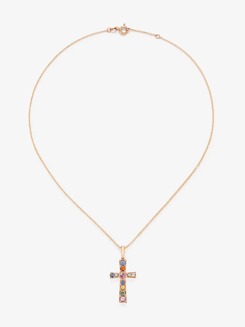 Colgante cadena cruz de oro rosa de 18K con zafiro