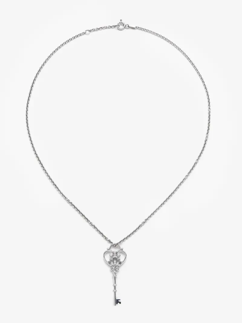 Colgante cadena llave de plata 925 con 3 diamantes en talla brillante de 0,05 cts