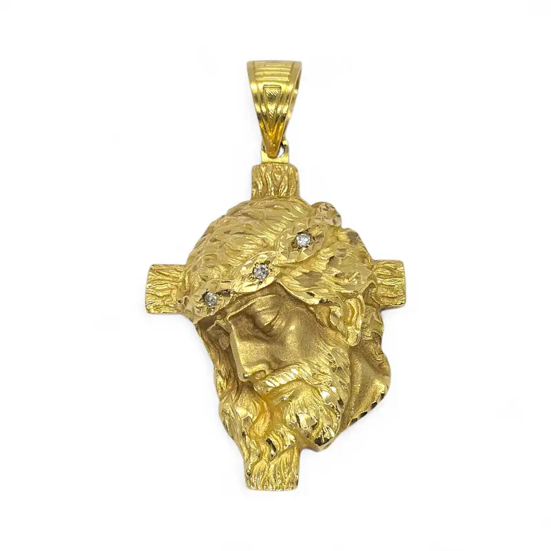 Colgante Cristo en Oro Amarillo de 18 Quilates con 3 Diamantes Naturales