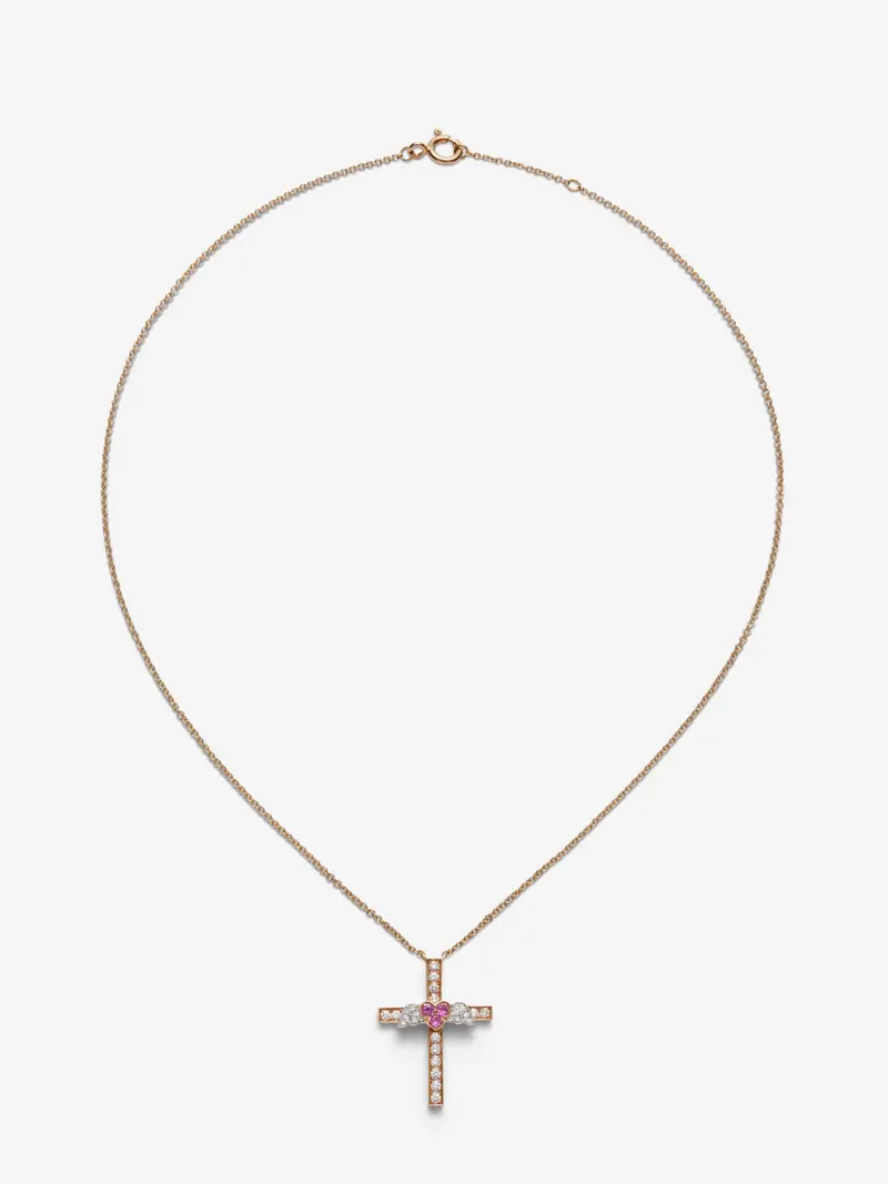 Colgante cruz de oro blanco y rosa de 18K con 26 diamantes en talla brillante con un total de 0,29 cts y 3 zafiros rosas en talla brillante con un total de 0,11 cts