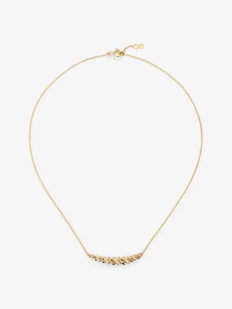 Colgante de oro amarillo de 18K con 24 diamantes en talla brillante con un total de 0,2 cts