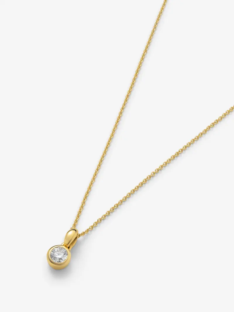 Colgante de oro amarillo de 18K con diamante en talla brillante de 0,4 cts