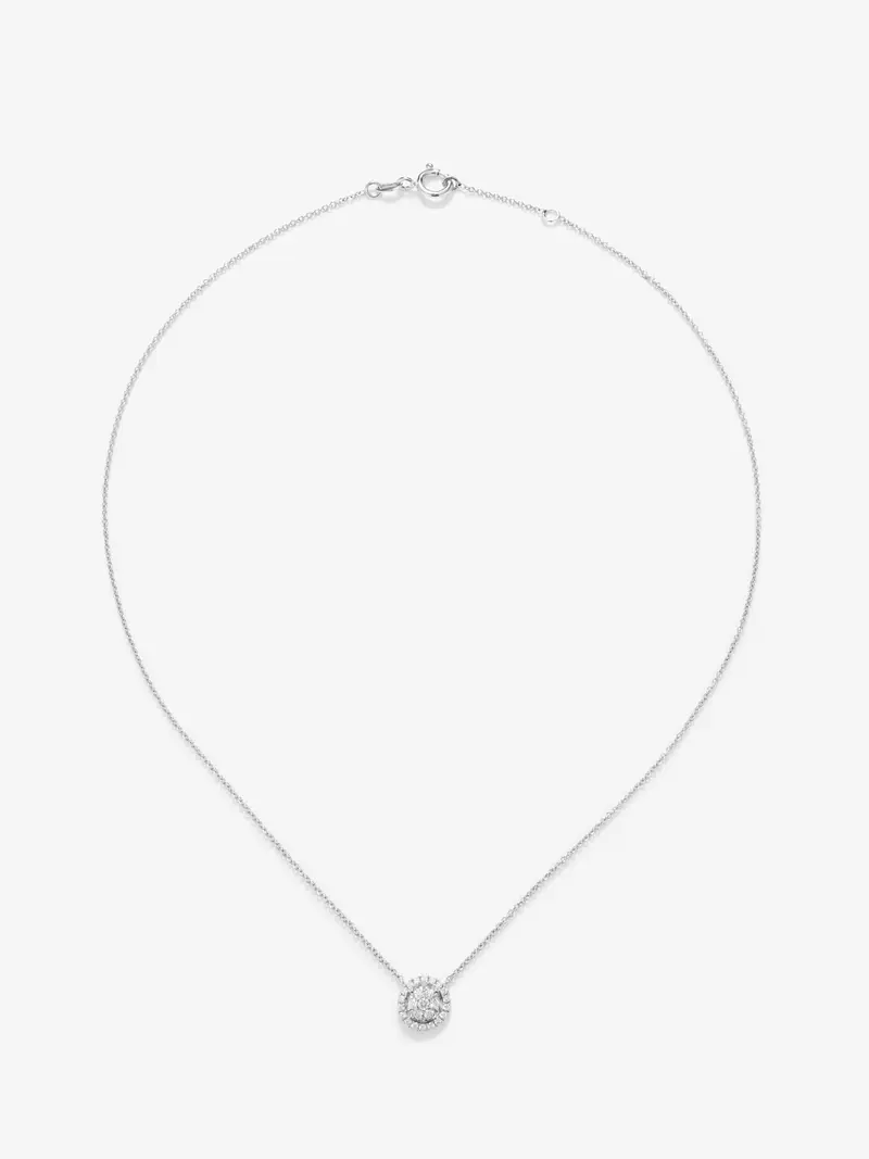 Colgante de oro blanco de 18K con 25 diamantes en talla brillantes con un total de 0,31 cts