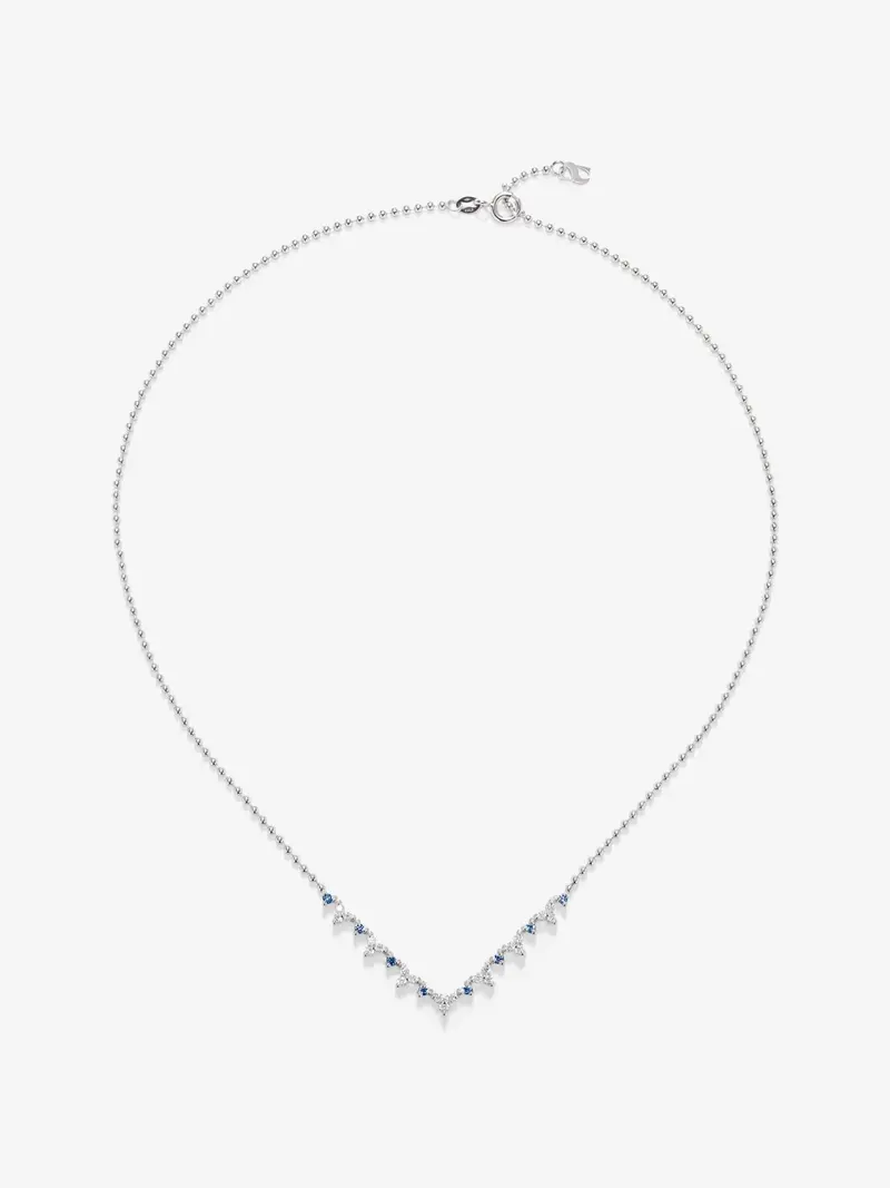 Colgante de oro blanco de 18K con 8 zafiros azules en talla brillante con un total de 1,35 cts y 21 diamantes en talla brillante con un total de 1,25 cts