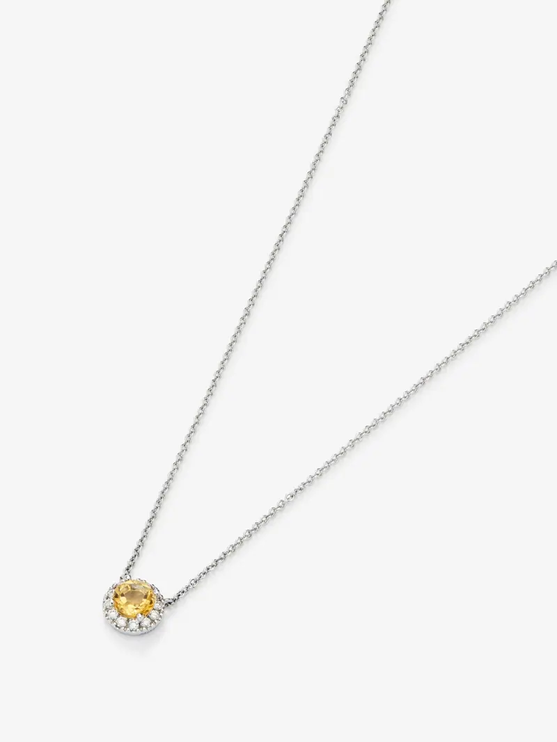 Colgante de oro blanco de 18K con cuarzo citrino 0,57 cts y diamantes 0,14 cts