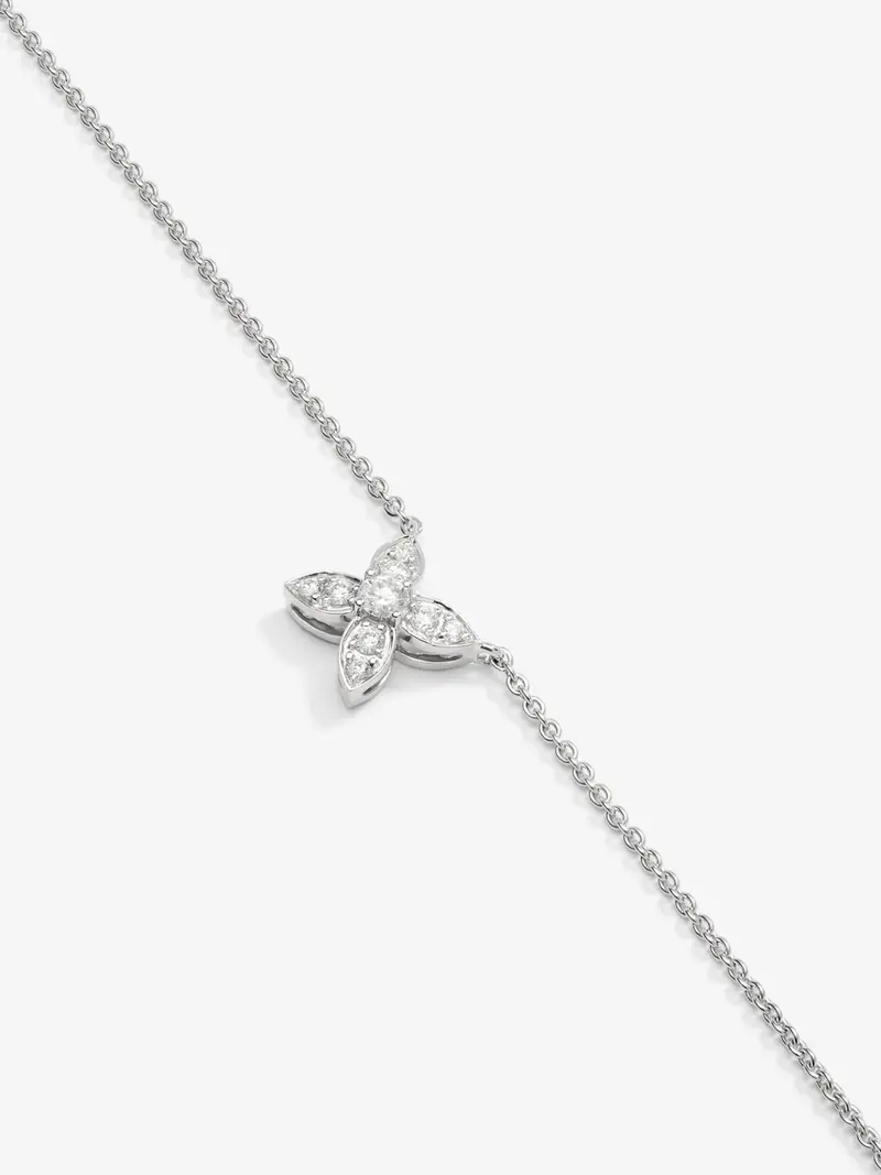Colgante de oro blanco de 18K con diamantes blancos en talla brillante de 0,18 cts