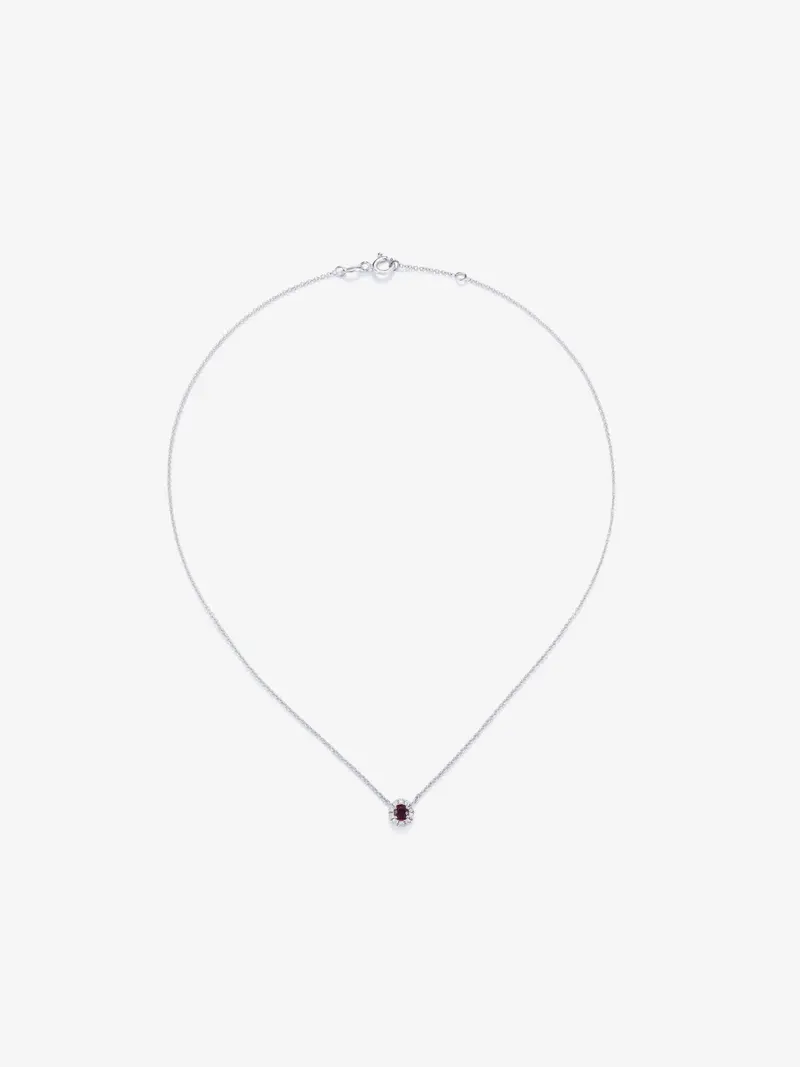Colgante de oro blanco de 18K con rubí en talla brillante de 0,19 cts y diamantes en talla brillante de 0,05 cts