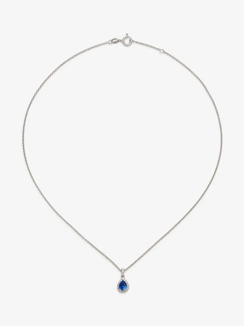 Colgante de oro blanco de 18K con zafiro azul y diamantes