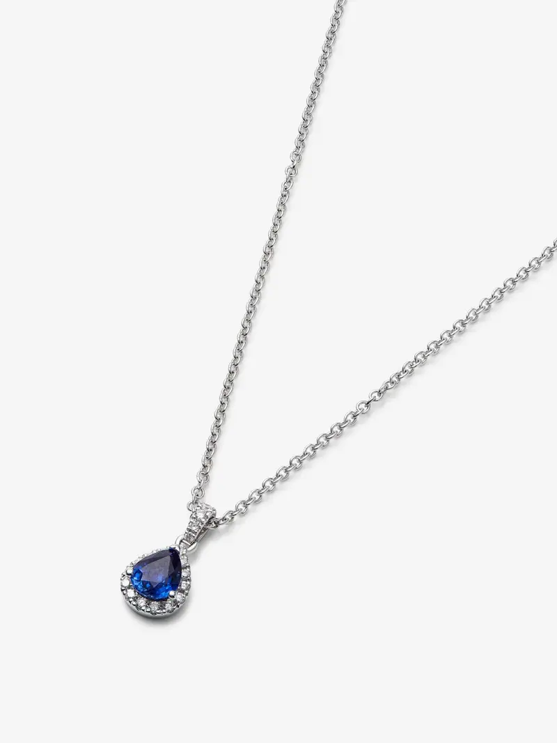 Colgante de oro blanco de 18K con zafiro azul