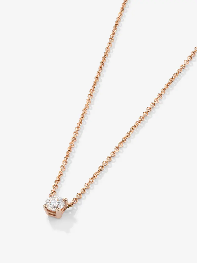 Colgante solitario de oro rosa de 18K con diamante en talla brillante de 0,15 cts