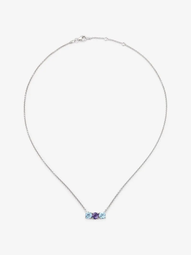 Colgante tresillo de plata 925 con topacios azuls swiss y amatista morada