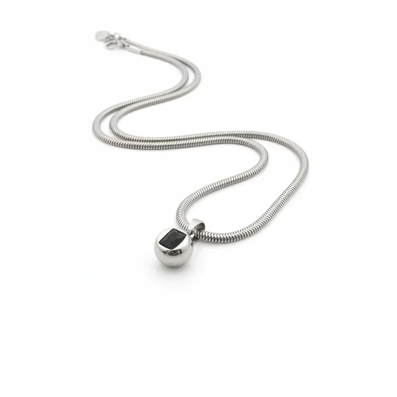 Collar acero tipo serpiente con charm esfera acabado plata