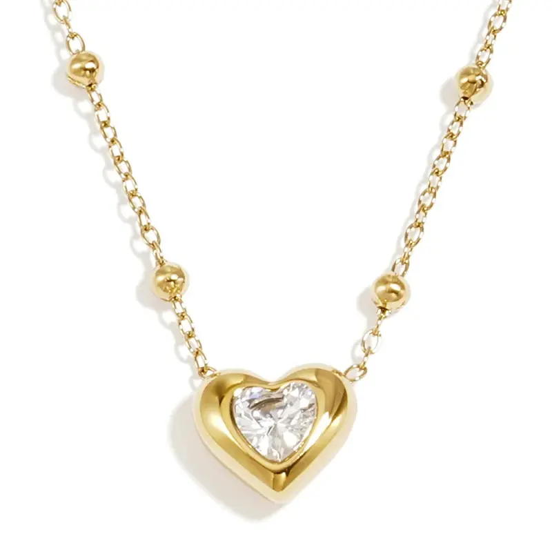 Collar de acero con corazón y circonita en acabado oro