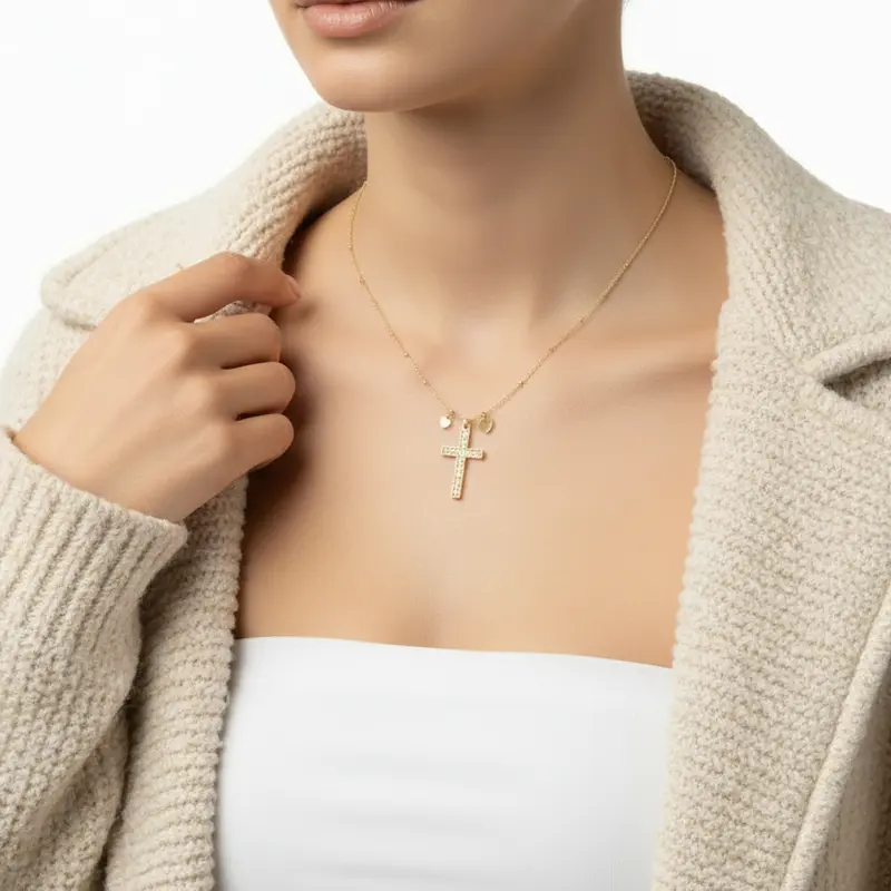 Collar de acero con cruz de circonitas y cadena con esferas acabado oro
