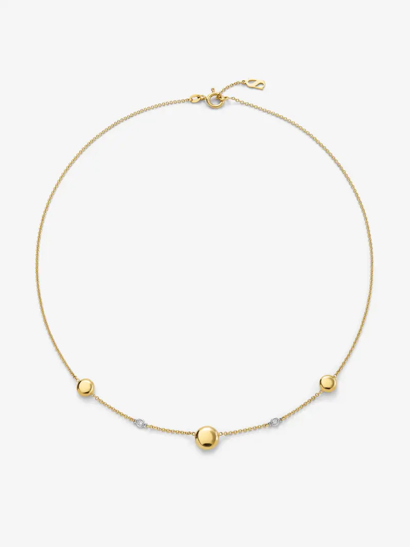 Collar de oro amarillo de 18K con 2 diamantes en talla brillante con un total de 0,04 cts y motivos de esfera