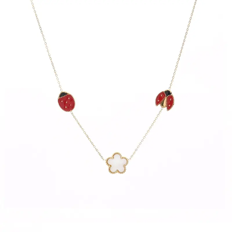 Collar en acero inoxidable con mariquitas y trébol acabado oro - mbyou