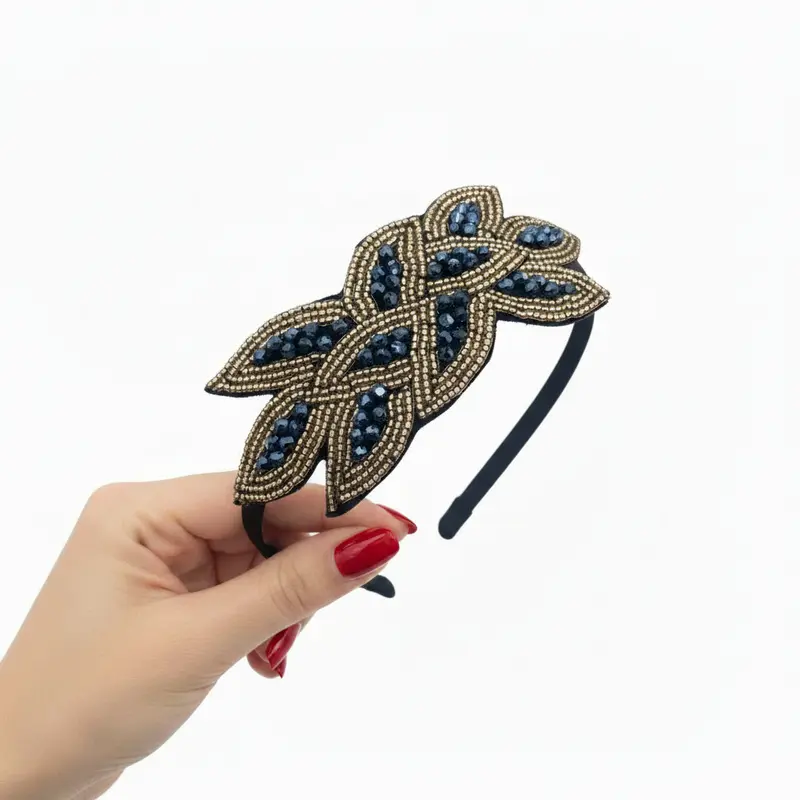 Diadema fiesta brillis dorados y azules con forma de flor