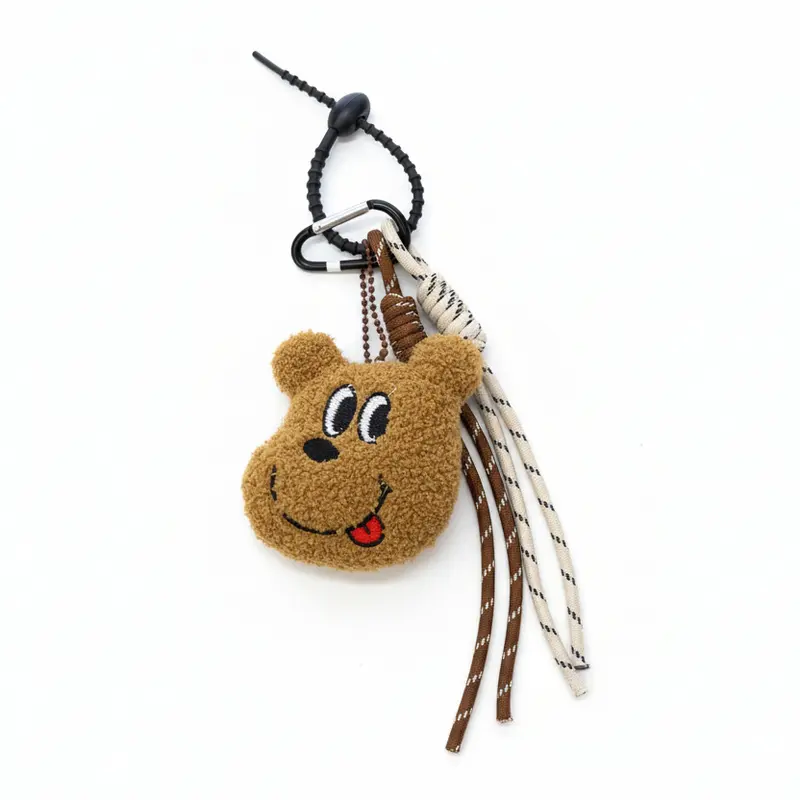 Llavero con peluche de oso y dos cuerdas en beige y marrón