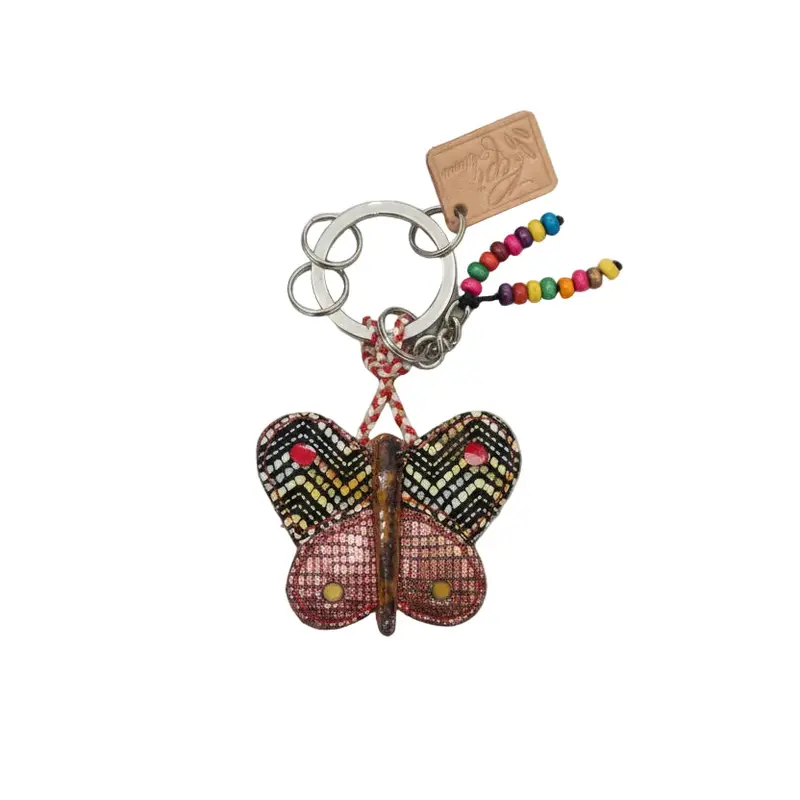 Llaveros hechos artesanalmente de cuero en froma de mariposas con diferentes estampados