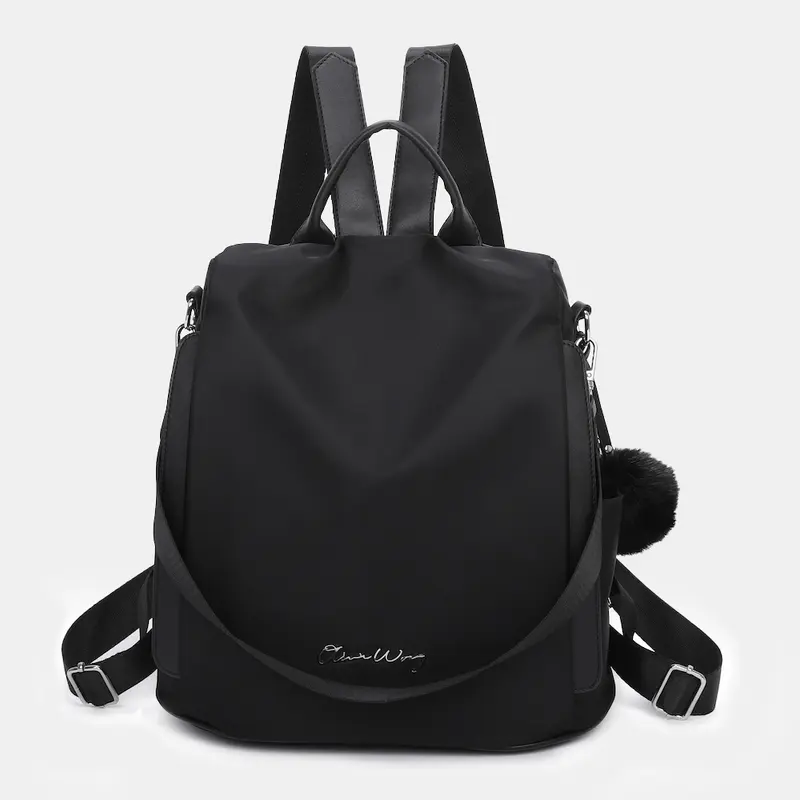 Mochila antirrobo Impermeable para mujer (14.80L) | Mochila Convertible en bolso con pompón y asa desmontable de adorno Negro