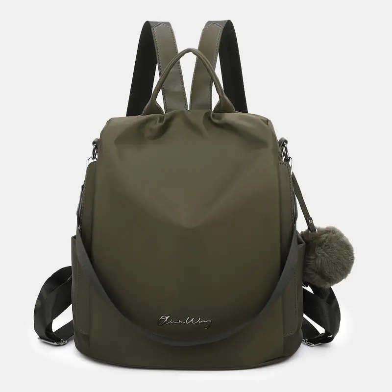 Mochila antirrobo Impermeable para mujer (14.80L) | Mochila Convertible en bolso con pompón y asa desmontable de adorno Verde