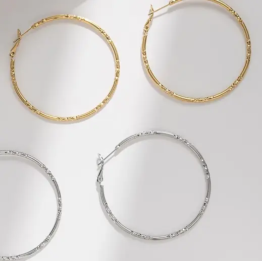 Pendientes de acero aro con textura acabado oro