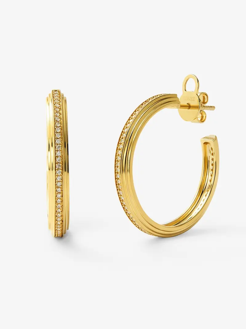 Pendientes de aro de oro amarillo de 18K con 124 diamantes en talla brillante con un total de 0,3 cts