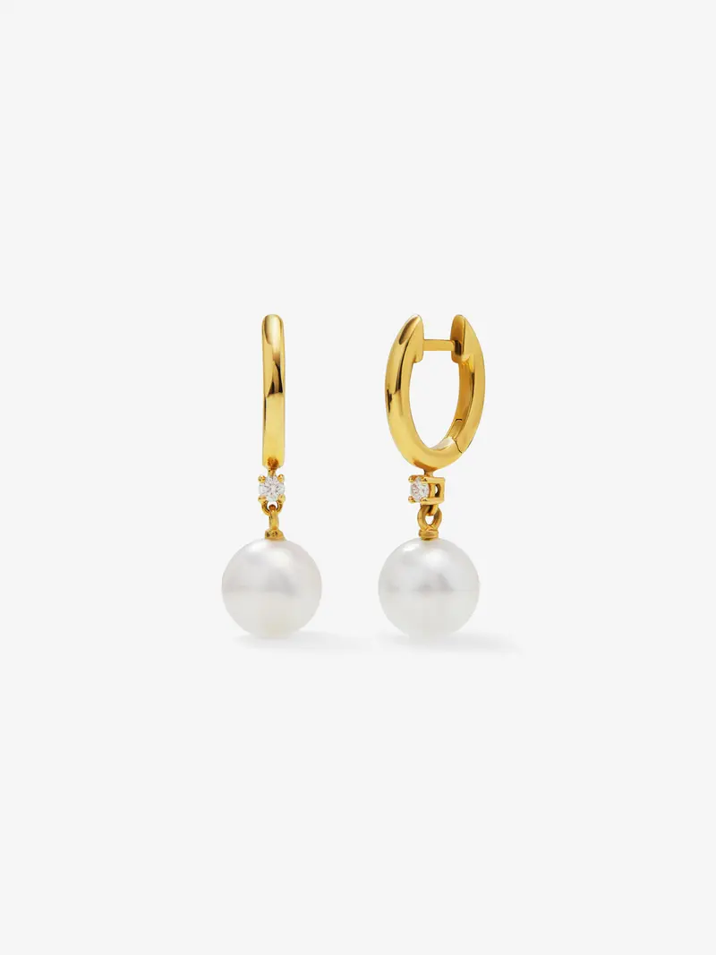 Pendientes de oro amarillo de 18K con 2 diamantes en talla brillante con un total de 0,065 cts y 2 perlas australianas de 8,5mm