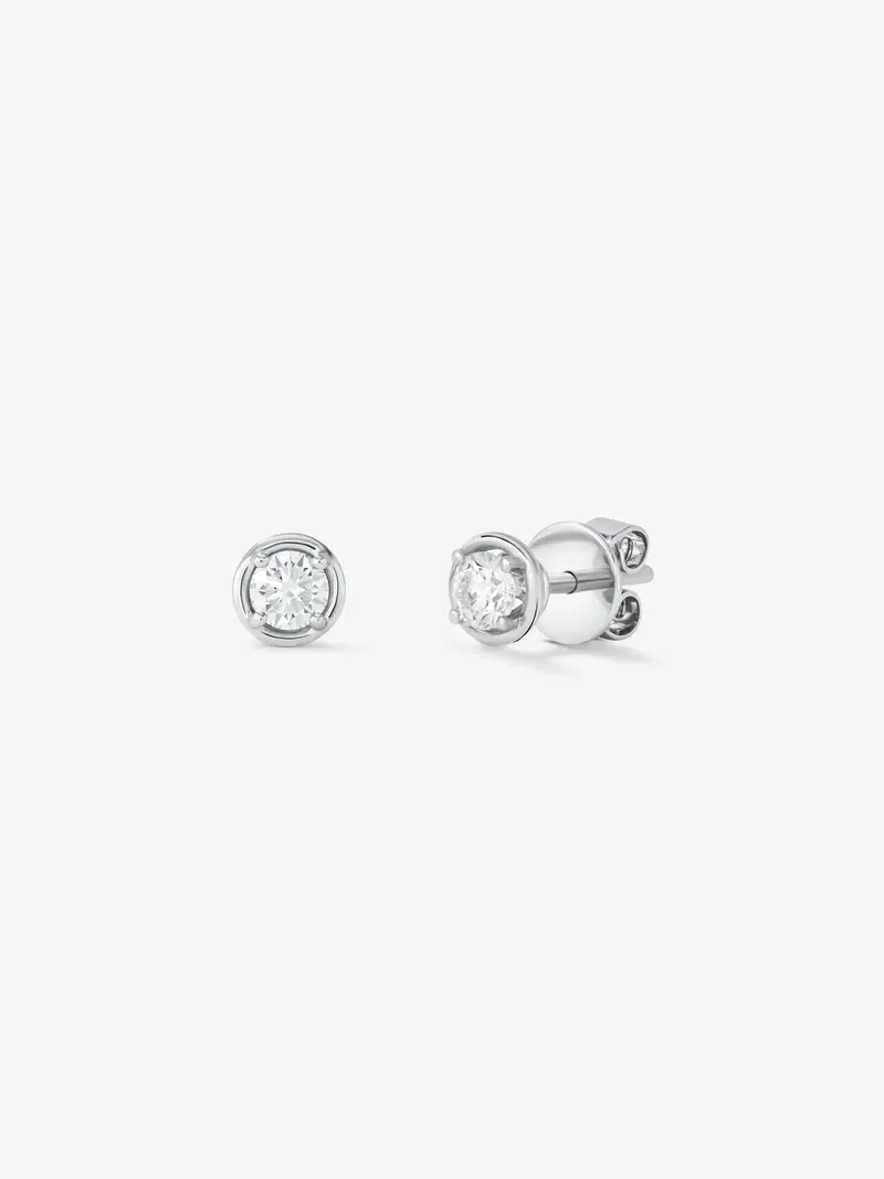 Pendientes de oro blanco de 18K con 2 diamantes en talla brillante con un total de 0,4 cts
