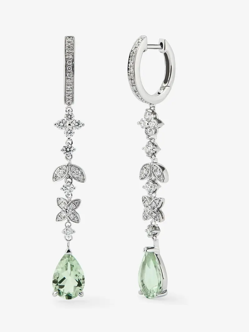 Pendientes de oro blanco de 18K con 64 diamantes en talla brillante con un total de 0,64 cts y 2 amatistas verdes en talla pera