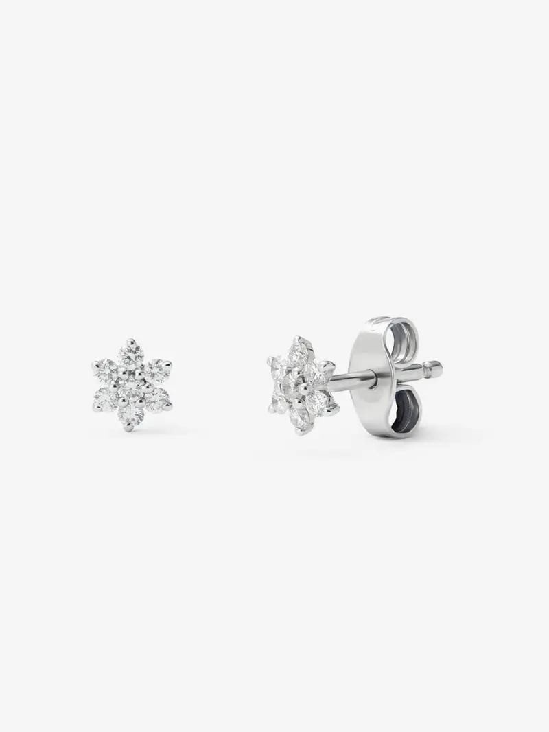 Pendientes de oro blanco de 18K con diamantes en talla brillante de 0,2 cts con forma de estrella